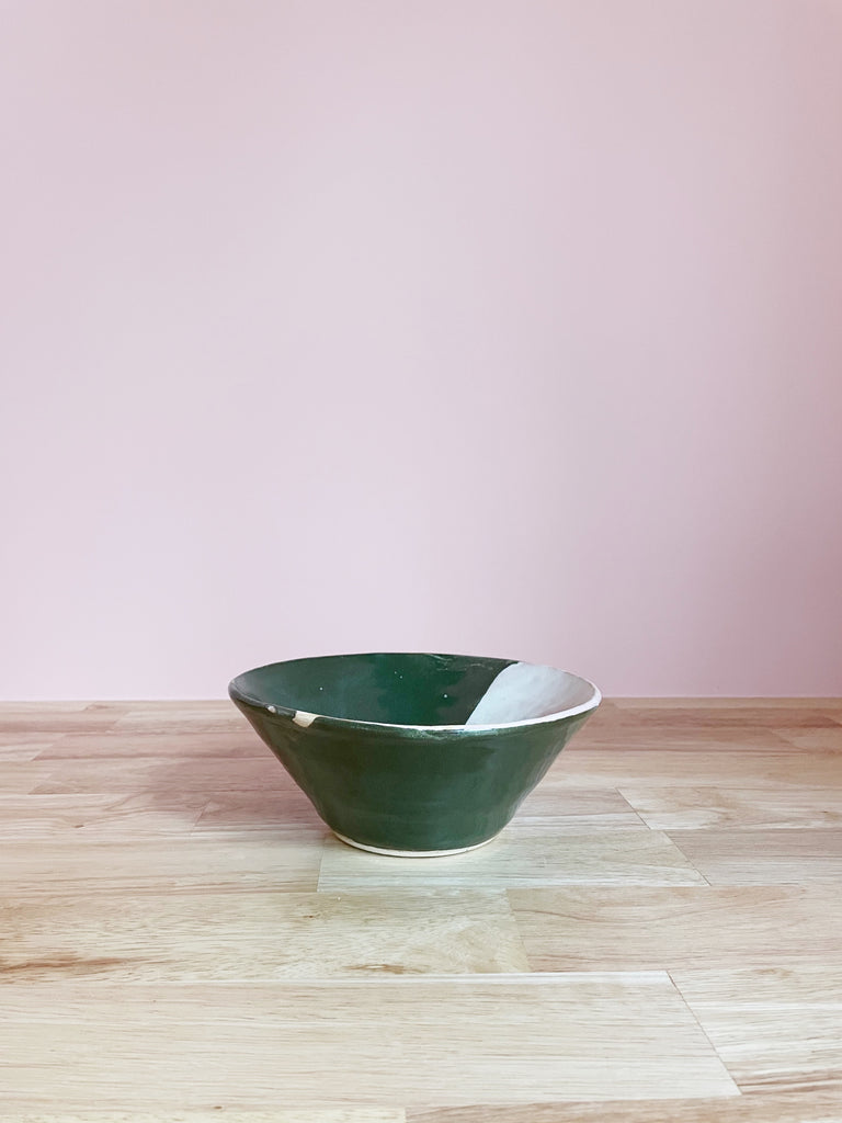 green and white glazed ceramic bowl