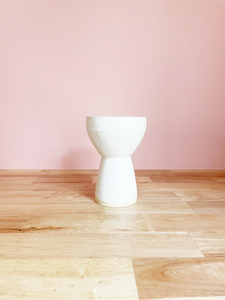 white tall pedestal bowl with white matte glaze