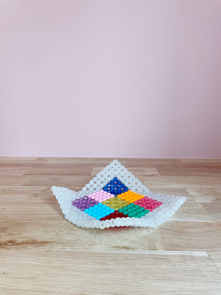 beaded object in multicolored arrangment