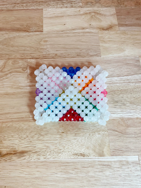 beaded object in multicolored arrangement